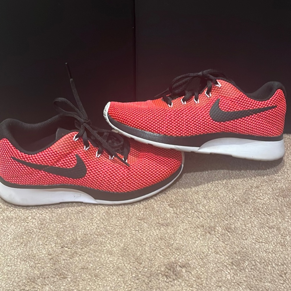 Hot pink and black Nike shoes size 6.5
